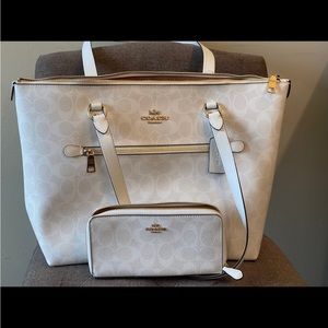 All white coach tote with zip around matching coach wallet